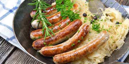 sausages and onions in a pan