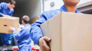 removalists carrying boxes