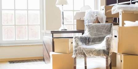 room of packed contents and furniture