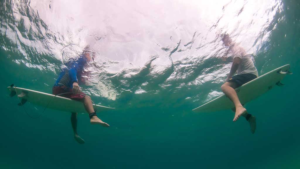 surfers on boards