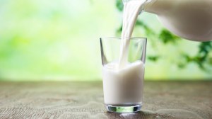 glass of milk being poured