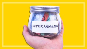 hand holding jar of australian money labelled superannuation
