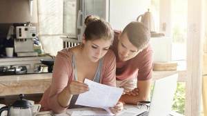 couple checking energy bill