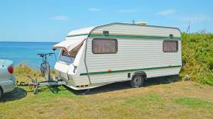 caravan parked near ocean lemon caravan