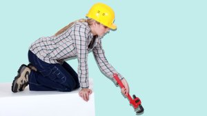 tradesperson with wrench