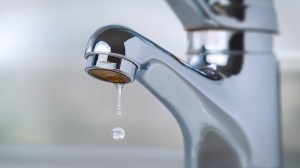 tap with rusty faucet aerator needing a clean