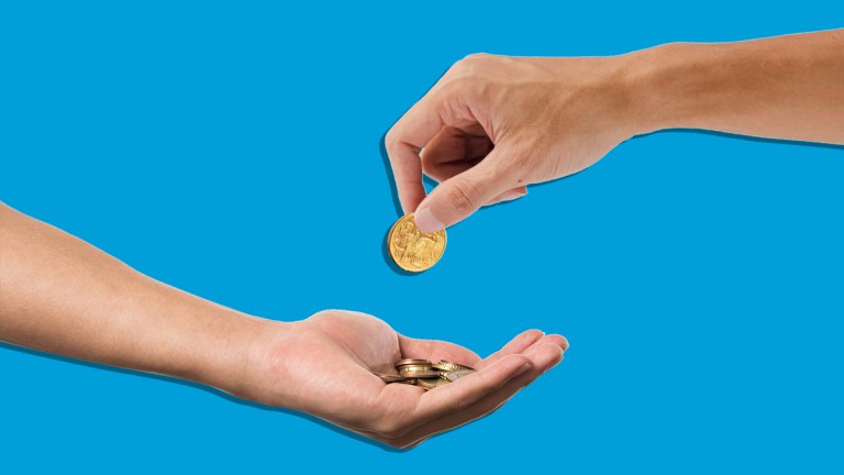 one hand gives money to another