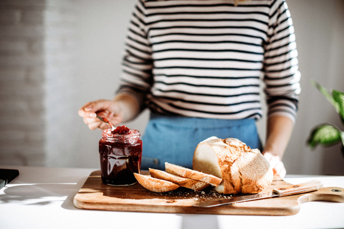 woman_using_store_bought_strawberry_jam
