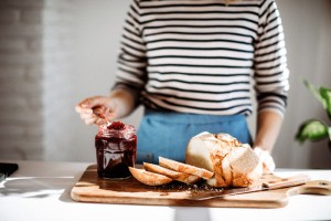 woman_using_store_bought_strawberry_jam