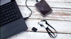 storage drives and laptop on table new