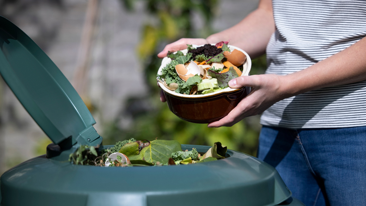 putting_scraps_into_a_compost_bin_lead