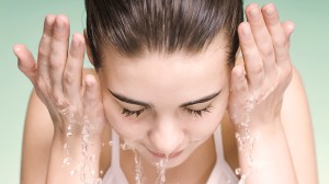 woman washing face
