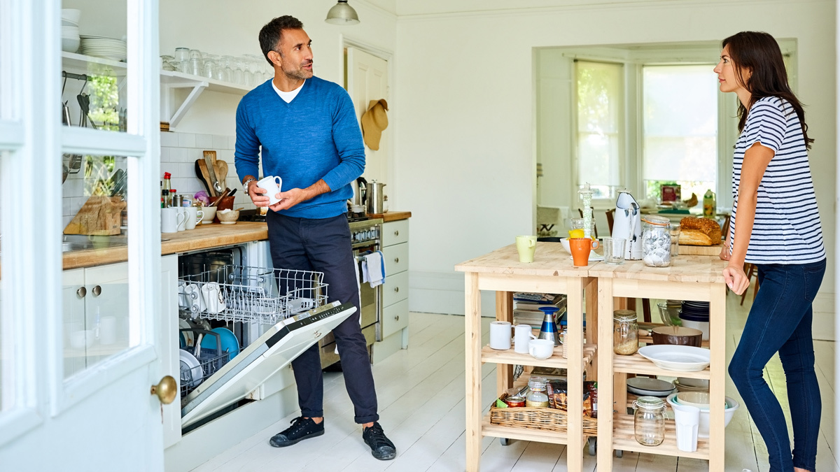 couple standing kitchen with dishwasher lead