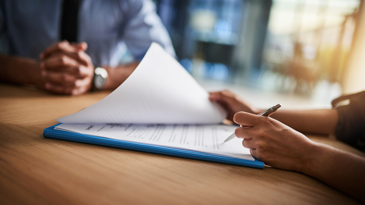 signing insurance papers