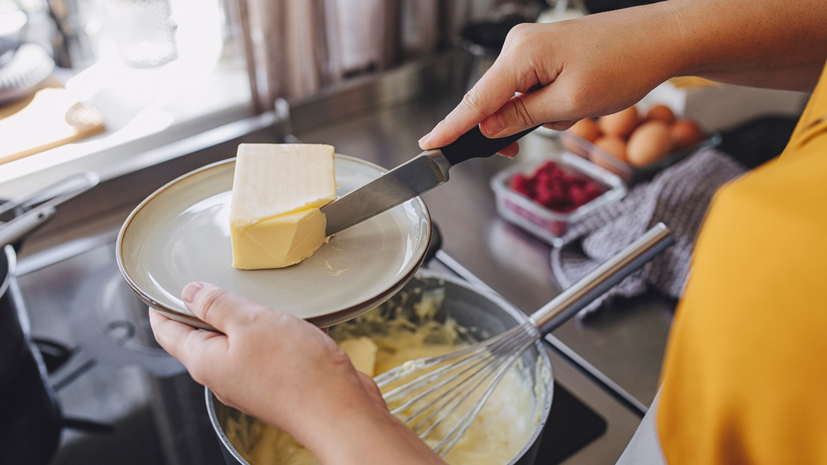 person_cooking_with_butter_lead