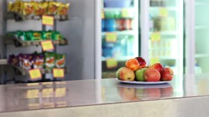 plate of apples in a small grocery store