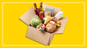 an open box of groceries on a yellow background