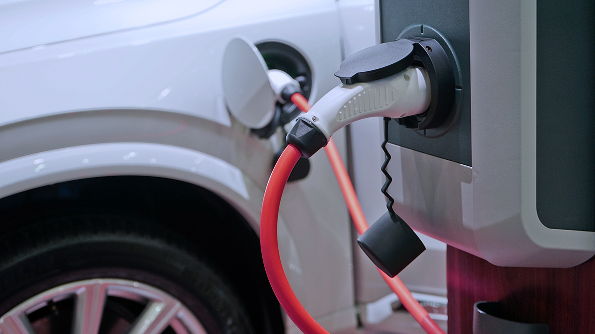 charging an electric car at a station