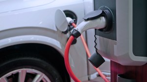 charging an electric car at a station
