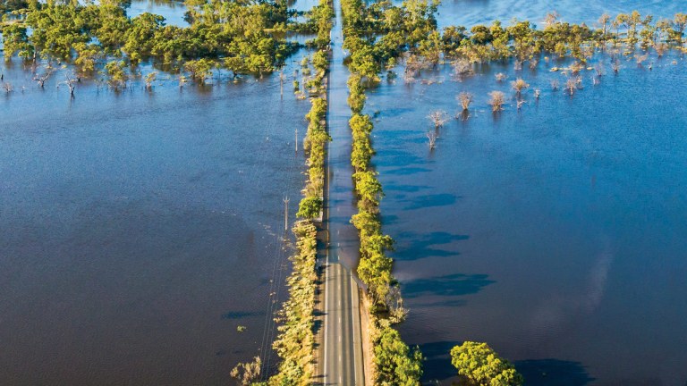 flood_waters_over_road_in_australia