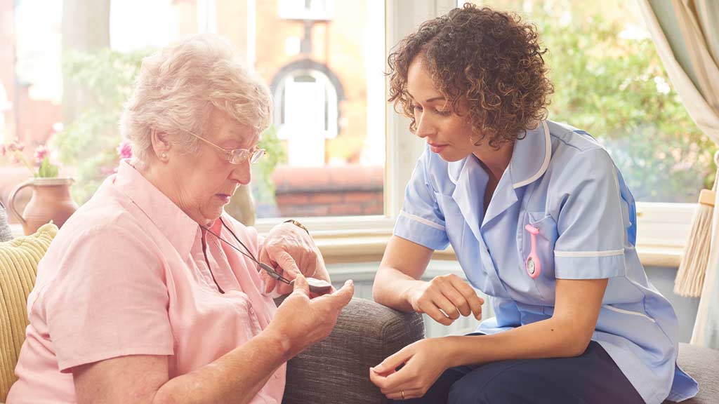 two women looking at alarm