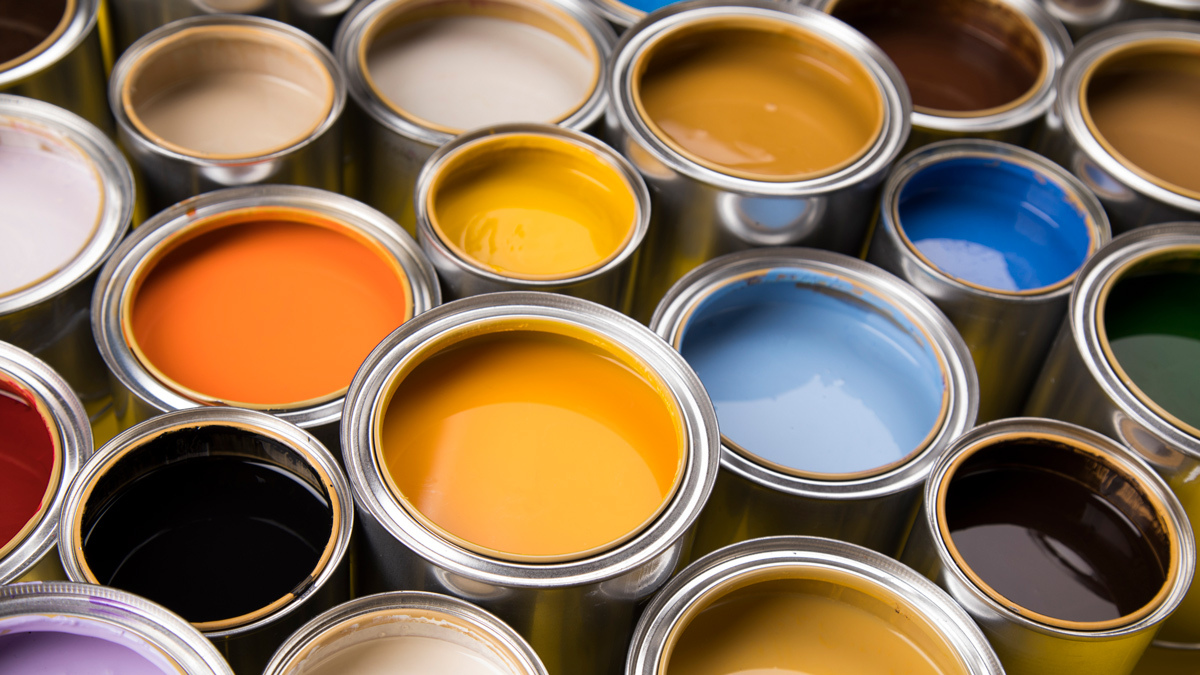 lots of empty paint cans