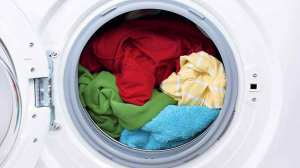washing machines loaded with clothes