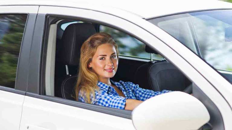 woman drives car