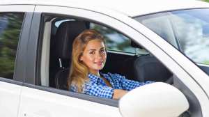 woman drives car