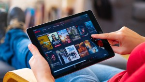 Person looking at Netflix on a tablet