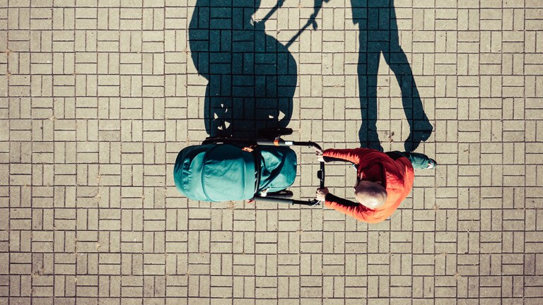 view from above of person pushing a stroller