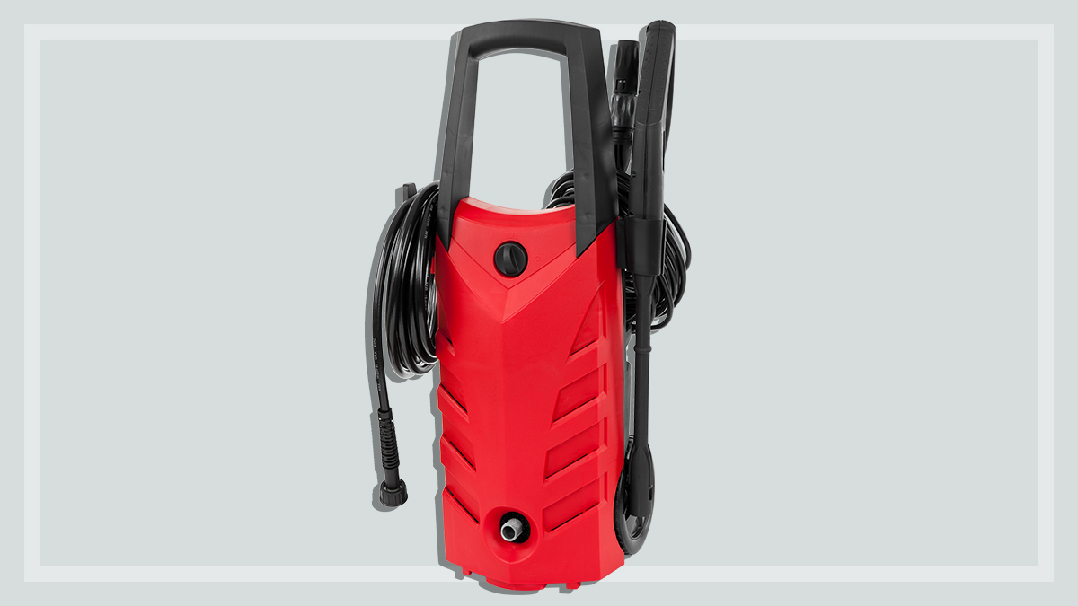 red and black pressure cleaner on a grey background