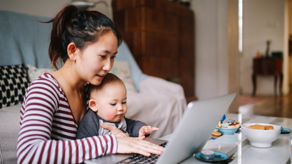 single_mother_looking_at_insurance_on_laptop