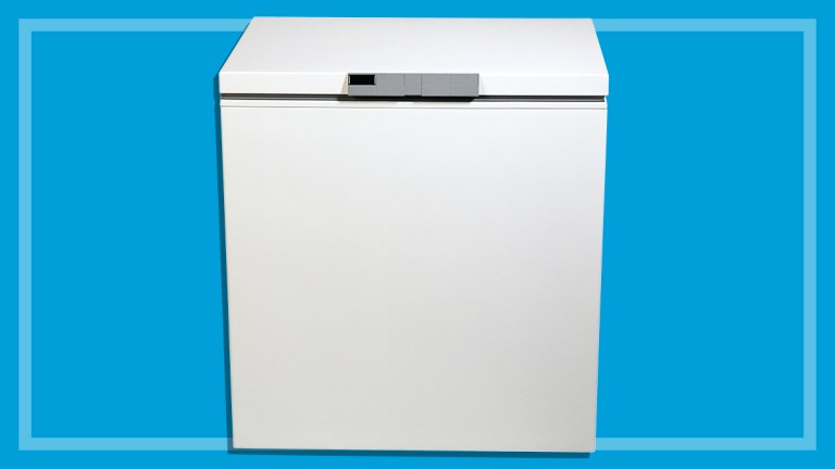white chest freezer on a blue background