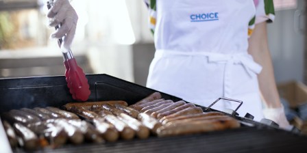 alice cooking the sausages