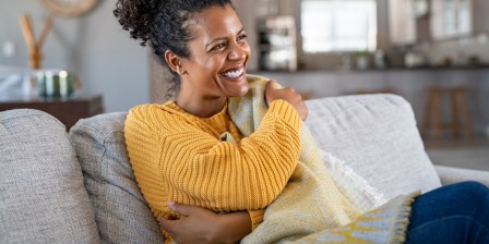 woman warm in winter blanket lead