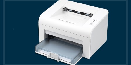 Cheap laser printer on a navy background