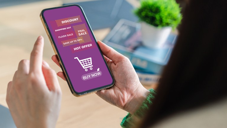 person shopping on smartphone inundated with sales messaging