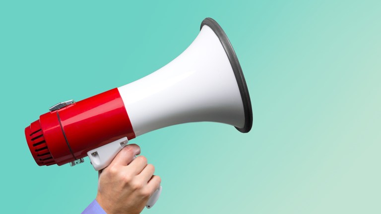 2_hand_holding_megaphone