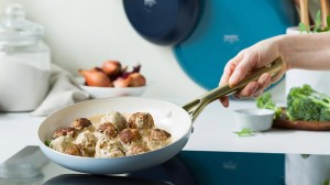 cooking with a ceramic frypan on an induction cooktop