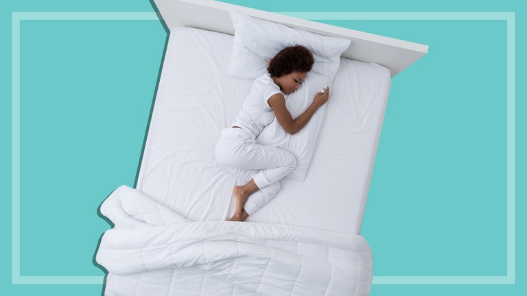 woman sleeping on bed doona