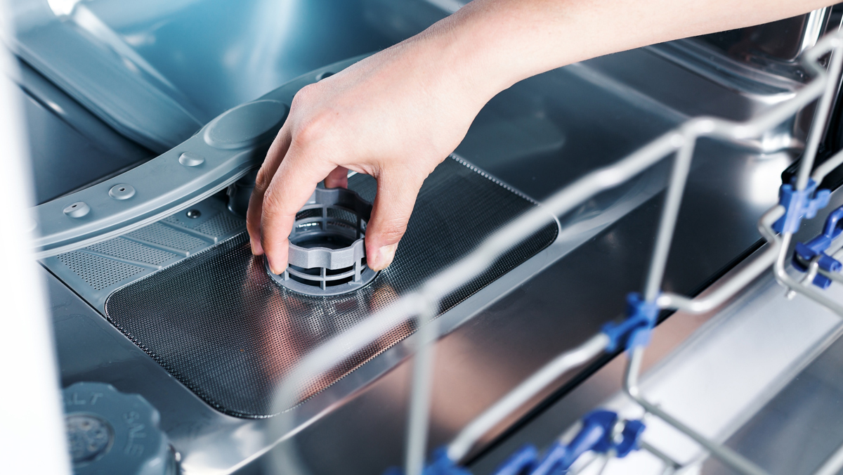 cleaning the drain of a dishwasher
