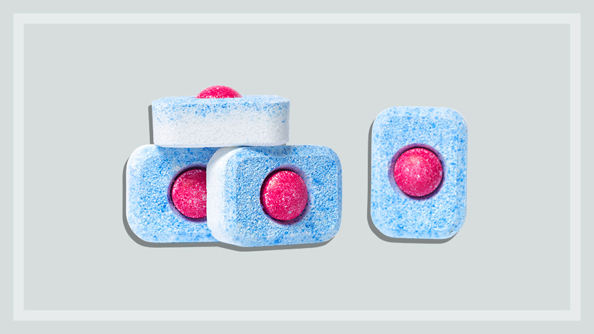 dishwasher detergent tablets on a grey background