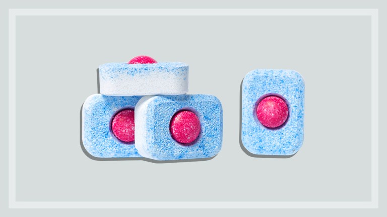 dishwasher detergent tablets on a grey background